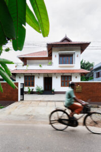 Front view of a modern house with traditional roof design