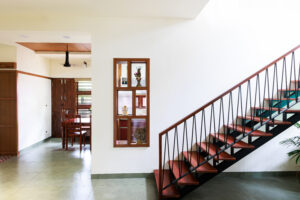 Modern home interior with wooden staircase and decor -1