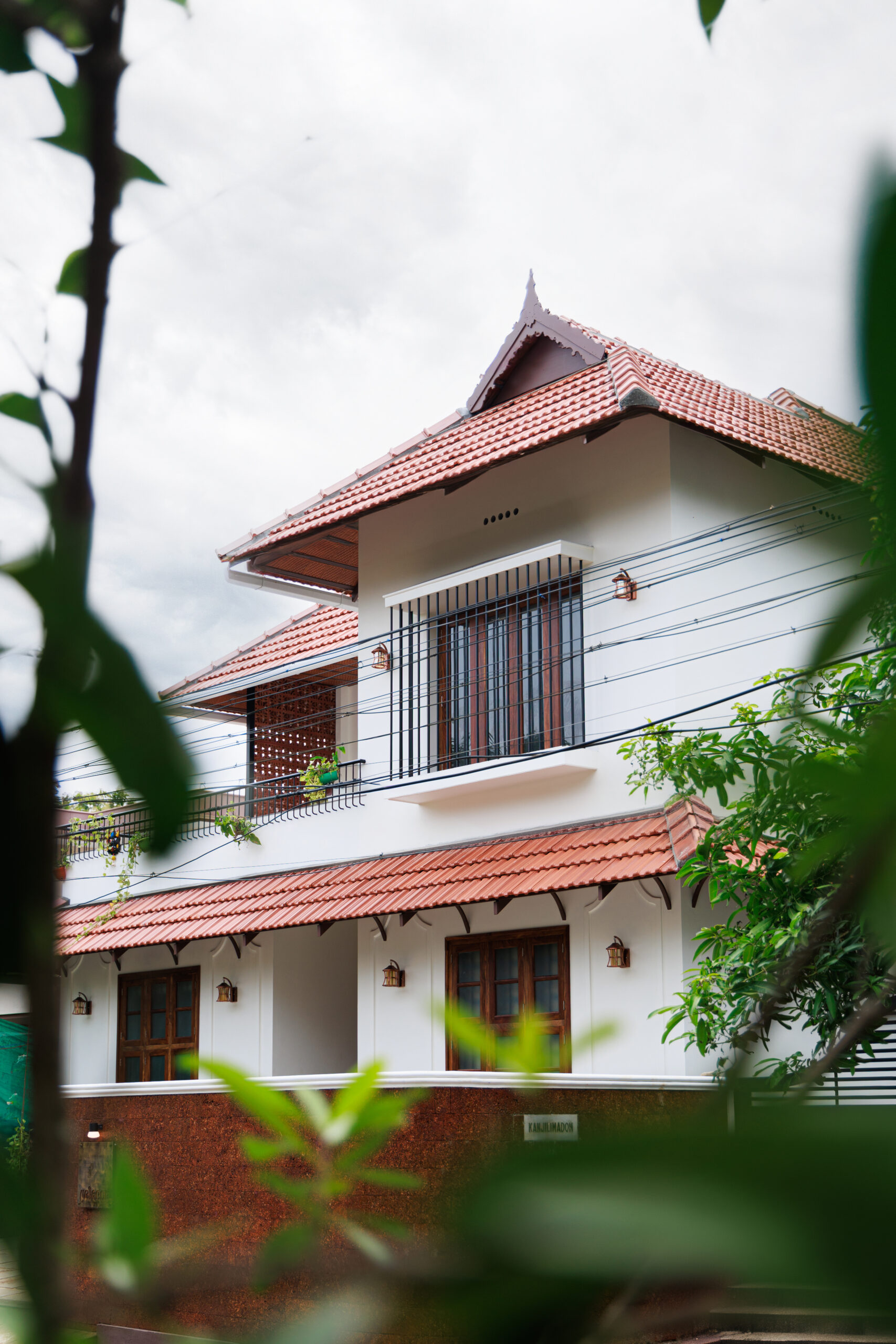 Front view of a modern house with traditional roof design -1