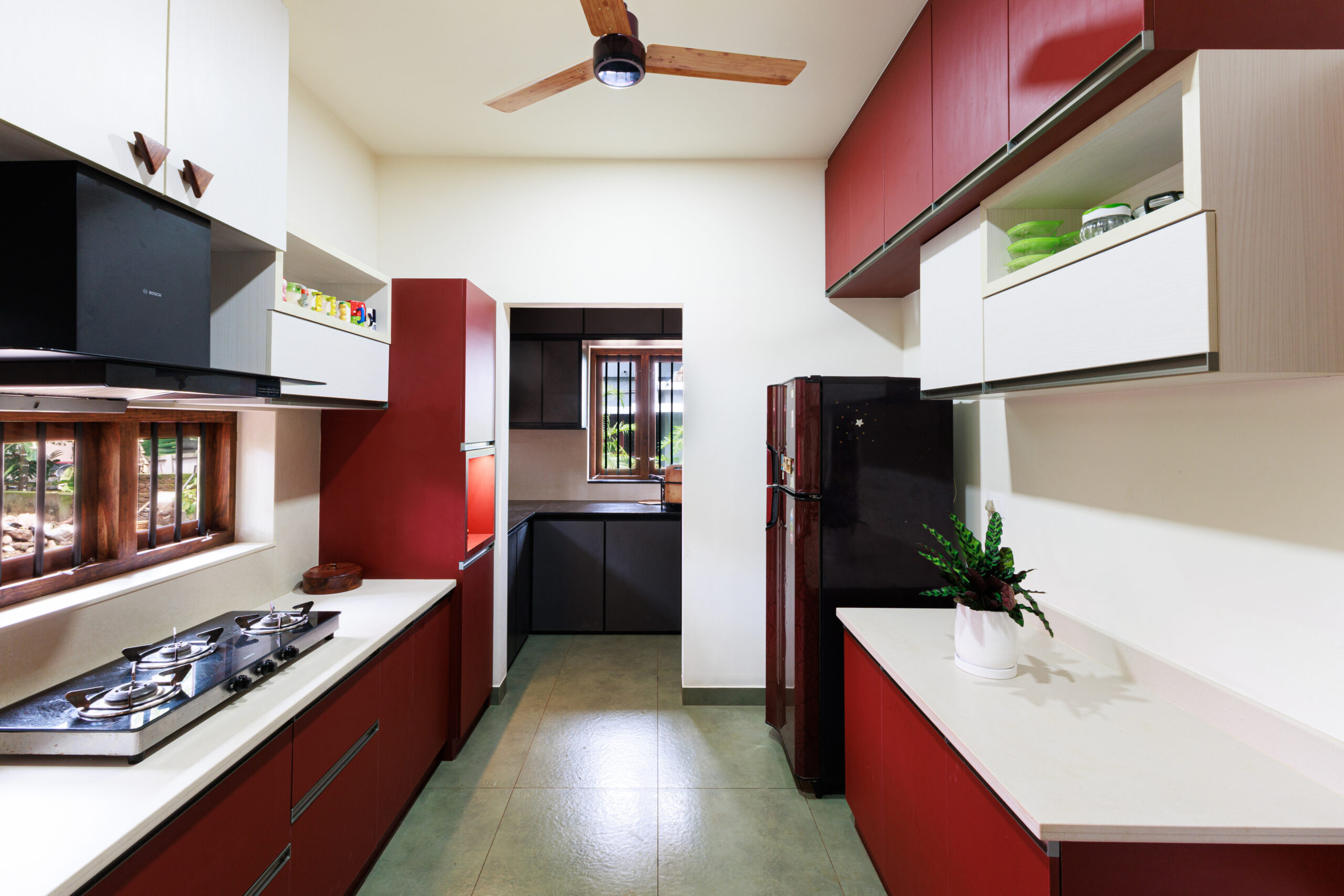 Modern kitchen interior by a construction company in Thrissur